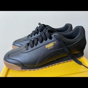 Black leather MAN Puma sneakers; size 10.5 (man)